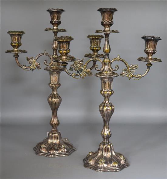 A pair of plated two branch, three light candelabra, H40.5 cms